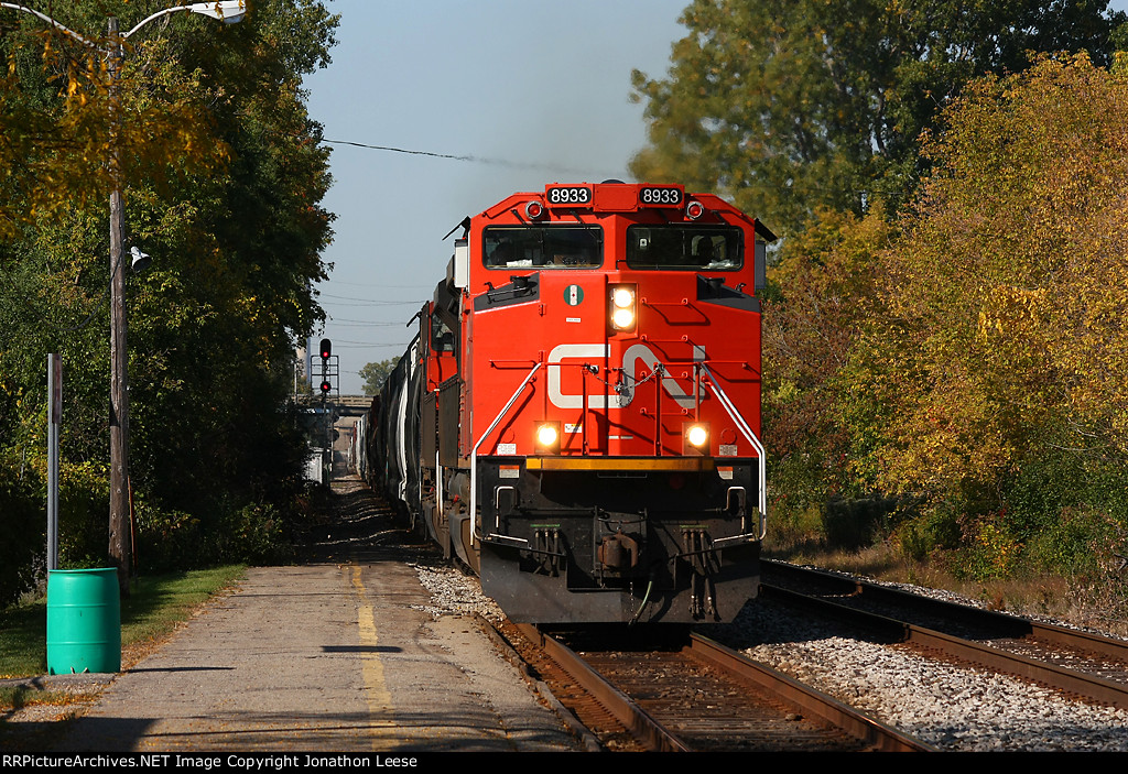 CN 8933 and another SD70M-2 fly through Trowbridge with a mixed freight